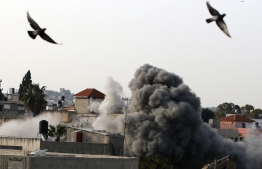 Israeli forces blow up the family house of Palestinian assailant Omar Abu Laila, in Az-Zawiya village, in the Israeli-occupied West Bank, April 24, 2019. - Israeli forces on March 19 shot dead a Omar Abu Laila, suspected of killing an Israeli rabbi and a soldier in the occupied West Bank, the Shin Bet internal security service said. Troops, police and security agents surrounded a building in the West Bank village of Abwein, north of Ramallah, in which the suspect was hiding according to a Shin Bet statement. The suspect, Omar Amin Abu Laila, opened fire and was killed in the shootout, Shin Bet said. (Photo by JAAFAR ASHTIYEH / AFP)