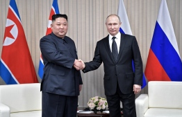 Russian President Vladimir Putin meets with North Korean leader Kim Jong Un at the Far Eastern Federal University campus on Russky island in the far-eastern Russian port of Vladivostok on April 25, 2019. (Photo by Alexey NIKOLSKY / SPUTNIK / AFP)