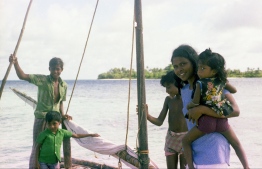 A bunch of Maldivian children on a sail dhoni (traditional boat). PHOTO: FRANK BURNABY