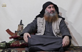 In this undated tv grab taken from a video released by Al-Furqan media, the chief of the Islamic State group Abu Bakr al-Baghdadi purportedly appears for the first time in five years in a propaganda video in an undisclosed location. - The elusive chief of the IS group al-Baghdadi has appeared for the first time in five years in a propaganda video released on April 29 by the jihadist organisation. It is unclear when the footage was filmed, but Baghdadi referred in the past tense to the months-long fight for Baghouz, IS's final bastion in eastern Syria, which ended last month. (Photo by - / various sources / AFP) / THIS PICTURE WAS MADE AVAILABLE BY A THIRD PARTY. AFP CAN NOT INDEPENDENTLY VERIFY THE AUTHENTICITY, LOCATION, DATE AND CONTENT OF THIS IMAGE. THIS PHOTO IS DISTRIBUTED EXACTLY AS RECEIVED BY AFP. RESTRICTED TO EDITORIAL USE - MANDATORY CREDIT "AFP PHOTO / SOURCE / AL-FURQAN" - NO MARKETING - NO ADVERTISING CAMPAIGNS - DISTRIBUTED AS A SERVICE TO CLIENTS / 