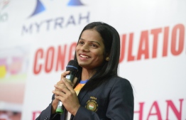 (FILES) In this file photo taken on September 1, 2018 Indian sprinter Dutee Chand speaks during a press conference in Hyderabad. - Indian gender-row sprinter Dutee Chand on May 2, 2019 said Caster Semenya's court defeat over testosterone rules was "wrong", but backed the Olympic 800 metres champion to overcome the potentially far-reaching ruling. (Photo by NOAH SEELAM / AFP)