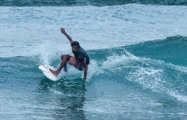 Ahmed Agil from Thuludhoo, Kaafu Atoll, surfing during the recently held 'The Trials' competition held by Maldives Surfing Association. PHOTO: HUSSEIN WAHEED/ MIHAARU