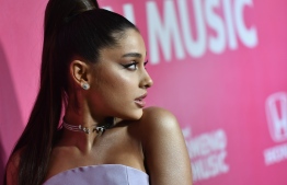 (FILES) In this file photo taken on December 06, 2018, US singer Ariana Grande attends Billboard's 13th Annual Women In Music event at Pier 36 in New York. - French luxury fashion house Givenchy on May 10, 2019, named pop royalty Ariana Grande the face of its fall/winter campaign, calling her "a strong, independent woman of refreshing character and style."
"A modern muse and the voice of a generation, Ariana has emerged as one of the most influential forces in pop culture today," Givenchy, a legendary brand owned by the conglomerate LVMH, said in a statement. (Photo by Angela Weiss / AFP)