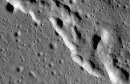 In this image, a mosaic composed of many images taken by NASA's Lunar Reconnaissance Orbiter (LRO), and released by NASA on May 13, 2019, show wrinkle ridges in a region of the Moon called Mare Frigoris. - The Moon is steadily shrinking, causing wrinkling on its surface and quakes, according to an analysis of imagery captured by NASA's Lunar Reconnaissance Orbiter (LRO) published Monday May 13, 2019. (Photo by HO / NASA / AFP) / RESTRICTED TO EDITORIAL USE - MANDATORY CREDIT "AFP PHOTO / NASA/ HO" - NO MARKETING NO ADVERTISING CAMPAIGNS - DISTRIBUTED AS A SERVICE TO CLIENTS