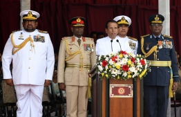 Sri Lankan President Maithripala Sirisena (C) delivers a speech during the National War Heroes Day in Colombo on May 19, 2019. - Sri Lanka's president marked the 10th anniversary of the end of a protracted war with Tamil rebels on May 19 by vowing to crush Islamist militants responsible for Easter bombings that killed 258 people. (Photo by LAKRUWAN WANNIARACHCHI / AFP)