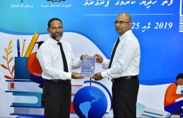 Home Minister Imran Abdulla (L) and Commissioner of Prisons Abdulla Munaz inaugurate the programme to donate books for prisons in Maldives. PHOTO: HUSSAIN WAHEED / MIHAARU