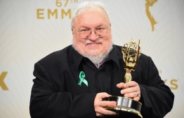 (FILES) In this file photo taken on September 20, writer George R. R. Martin, winner of Outstanding Drama Series for "Game of Thrones", poses in the press room at the 67th Annual Primetime Emmy Awards at Microsoft Theater in Los Angeles, California. - "Game of Thrones" fans have been dissecting the series finale -- and complaining about it -- for two days now, but they may get another shot at elation, or disappointment. Martin has suggested the ending could be very different from the one seen worldwide when he finally publishes the final two books in the saga. (Photo by Jason Merritt / GETTY IMAGES NORTH AMERICA / AFP)