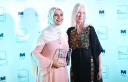 Arabic author Jokha Alharthi (L) and translator Marilyn Booth pose after winning the Man Booker International Prize for the book 'Celestial Bodies' in London on May 21, 2019. (Photo by Isabel INFANTES / AFP)