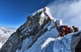 Climbers line up to stand at the summit of Mount Everest in this May 22 photo, released by climber Nirmal Purja's Project Possible expedition. (AFP/Getty Images) (Project Possible/AFP photo)