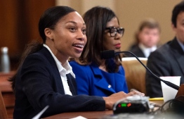 In this file photo taken on May 16, 2019 Six-time Olympic gold medalist Allyson Felix testifies before the US House Ways and Means Committee’s hearing on overcoming racial disparities and social determinants in the maternal mortality crisis, on Capitol Hill in Washington, DC. Olympic track and field star Allyson Felix joined a chorus of recent criticism against Nike on May 22, 2019, accusing the US sporting goods giant of penalizing female athletes who took time off to have a child. NICHOLAS KAMM / AFP