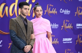 Canadian actor Mena Massoud and British actress Naomi Scott attend the World Premiere of Disney’s “Aladdin” at El Capitan theatre on May 21, 2019 in Hollywood. 
VALERIE MACON / AFP