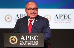 (FILES) In this file photo taken on November 16, 2018 Papua New Guinea's Prime Minister Peter O'Neill speaks during the Asia-Pacific Economic Cooperation (APEC) CEO Summit in Port Moresby. - O'Neill formally resigned on May 29, 2019, easing a months-long political crisis and calling a multi-billion-dollar French and US-backed gas deal into doubt. (Photo by Fazry ISMAIL / AFP)