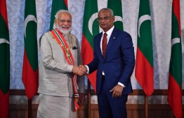 President Ibrahim Mohamed Solih confers Indian Prime Minister Narendra Modi with the Order of the rule of Izzudeen, in recognition of the many services he has performed to cement the longstanding, amicable ties between our two countries. PHOTO: PRESIDENT'S OFFICE