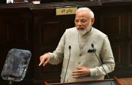 Indian Prime Minister Narendra Modi address the Maldivian parliament during his first state visit to Maldives on June 8, 2019. PHOTO: HUSSAIN WAHEED / MIHAARU