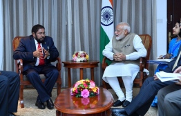 Indian Prime Minister Narendra Modi meeting Jumhooree Party leader and Maamigili MP Qasim Ibrahim. PHOTO: PRESIDENCY MALDIVES