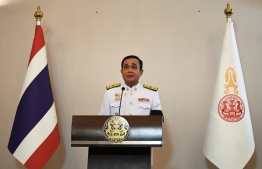 Prayut Chan-O-Cha speaks after the royal endorsement ceremony appointing him as Thailand’s new prime minister at Government House in Bangkok on June 11, 2019. Former junta chief Prayut Chan-O-Cha formally became Thailand's 29th prime minister on June 11 after a royal endorsement, completing a long transformation from soldier to civilian leader and vowing "love, unity and compassion".
Lillian SUWANRUMPHA / POOL / AFP
