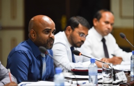 Muawwiz Rasheed (L), the newly elected president of the Anti-Corruption Commission, pictured at a parliamentary committee meeting. PHOTO: HUSSAIN WAHEED / MIHAARU