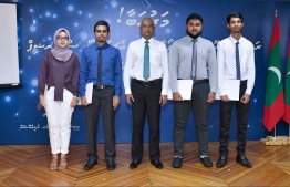 President Ibrahim Mohamed Solih posing for a photograph at the awarding ceremony of the President's Award and High Achievers Scholarship for GCE A-level top achievers of 2018. PHOTO: PRESIDENT'S OFFICE