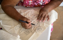 Mexican artisan Glafira Candelaria Jose, of the Otomi ethnic group, works in one of her designs at her workshop in San Nicolas village, in Tenango de Doria, Hidalgo state, Mexico, on June 18, 2019. - The Mexican government asked famous Venezuelan designer Carolina Herrera to explain her decision to use textile designs from three Mexican indigenous communities in six pieces of her Resort 2020 collection. (Photo by Pedro PARDO / AFP)
