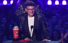 US director Anthony Russo accepts the award for Best Movie for "Avengers: Endgame" onstage during the 2019 MTV Movie & TV Awards at the Barker Hangar in Santa Monica on June 15, 2019. - The 2019 MTV Movie & TV Awards were filmed on June 15 and air on June 17. (Photo by VALERIE MACON / AFP)