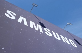 A billboard advertising the Samsung brand of electronics.