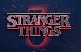 (FILES) In this file photo taken on June 28, 2019, the Stranger Things logo seen on the backdrop of Netflix's "Stranger Things 3" premiere at Santa Monica high school Barnum Hall  in Santa Monica, California. - Retro sci-fi mystery "Stranger Things" has broken Netflix viewing records with the global launch of its third season, the streaming giant said in a rare tweet publishing viewing data. The nostalgic 1980s show about a gang of suburban adolescents battling supernatural monsters had been watched by 40.7 million accounts since July 4, 2019, it said. (Photo by Chris Delmas / AFP)