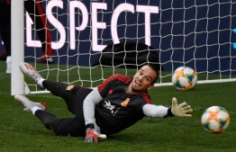 (FILES) In this file photo taken on June 09, 2019 Spain's goalkeeper Pau Lopez attends a training session at the Santiago Bernabeu stadium in Madrid on the eve of the UEFA Euro 2020 group F qualifying football match between Spain and Sweden. - Spain international goalkeeper Pau Lopez has completed his move from Real Betis to Serie A giants Roma, the two clubs announced late on July 10, 2019. The 24-year-old has signed a five-year deal with Roma paying 23.5 million euros ($26.48 million). (Photo by PIERRE-PHILIPPE MARCOU / AFP)