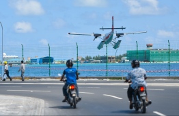 A seaplane lands at Velana International Airport (VIA). PHOTO: HUSSAIN WAHEED/ MIHAARU