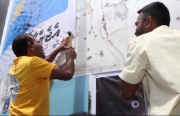 Mickail Naseem accompanying President Nasheed during the parliamentary elections campaign. PHOTO: Ahmed Azim