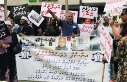 Victims of the Sea Life Global housing scam protests in front of Housing Development Corporation (HDC). PHOTO: MIHAARU