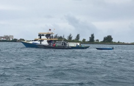 Maldives National Defence Force divers search for missing Bangladeshi expat fisherman. PHOTO: MIHAARU.