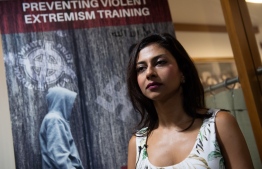 Tania Joya, the ex-wife of a senior leader for the Islamic State, speaks during an interview with AFP about her experience and the Preventing Violent Extremism Training, at the National Press Club in Washington, DC, July 19, 2019. (Photo by SAUL LOEB / AFP)