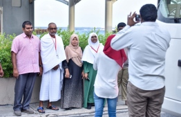 Locals snapping pictures at the airport before departing for the 2019 pilgrimage. Ministry of Foreign Affairs announced that special teams from the embassy will be aiding pilgrims this year. PHOTO: MIHAARU FIILES