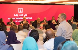 Shareholders expressing their opinions on BML's dividend pay-out during the bank's Annual General Meeting. PHOTO: BML