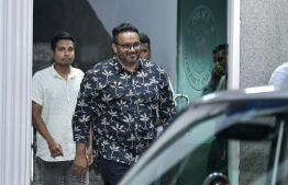 Former vice president Ahmed Adeeb pictured exiting the Maldives Police Service headquarters following his extradition. PHOTO: NISHAN ALI / MIHAARU