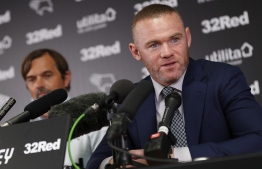 Wayne Rooney said he had the means and the will to make financial contributions, but felt the public pressure being exerted on players was unhelpful. PHOTO: AFP