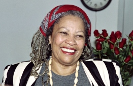 (FILES) In this file photo taken on October 7, 1993 US author Toni Morrison smiles in her office at Princeton University in New Jersey, while being interviewed by reporters. - Toni Morrison, the first African American woman to win the Nobel Prize for Literature, has died following a short illness, her family said in a statement on August 6, 2019. She was 88. "Although her passing represents a tremendous loss, we are grateful she had a long, well lived life," they said. (Photo by Don EMMERT / AFP)