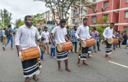 It is not an Eid parade unless accompanied with traditional 'Boduberu' music. Spectators join in on the songs, singing and dancing to their heart's content. PHOTO: NISHAN ALI/ MIHAARU