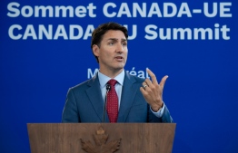 (FILES) In this file photo taken on July 18, 2019 Canadian Prime Minister Justin Trudeau participates in a joint press conference during the Canada-EU Summit in Montreal. Canada's ethics watchdog slammed Prime Minister Justin Trudeau on August 14, 2019, concluding in the lead-up October elections that he broke rules by arm-twisting his attorney general to settle a criminal case against engineering giant SNC-Lavalin. The scandal, revealed earlier this year, tarnished the prime minister's golden boy image, cost two ministers and two senior officials their jobs and plunged his Liberals into a dead heat with the opposition Conservatives in the polls.
Sebastien St-Jean / AFP