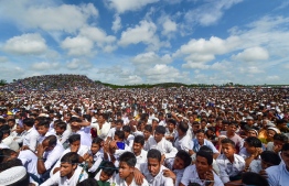 Rohingya refugees attend a ceremony organised to remember the second anniversary of a military crackdown that prompted a massive exodus of people from Myanmar to Bangladesh, at the Kutupalong refugee camp in Ukhia on August 25, 2019. Some 200,000 Rohingya rallied in a Bangladesh refugee camp on August 25 to mark two years since they fled a violent crackdown by Myanmar forces, just days after a second failed attempt to repatriate the refugees. PHOTO: MUNIR UZ ZAMAN / AFP