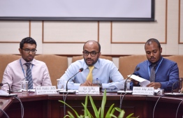Finance Minister Ibrahim Ameer (C) speaks at the budget committee meeting regarding the government-lobbied supplementary budget, on August 25, 2019. PHOTO: NISHAN ALI / MIHAARU