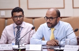 Finance Minister Ibrahim Ameer (R) speaks at the budget committee meeting regarding the government's proposal to extend the state budget, on August 25, 2019. PHOTO: NISHAN ALI / MIHAARU