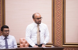 Minister of Finance Ibrahim Ameer speaking at the parliament. PHOTO: PARLIAMENT SECRETARIAT