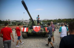 A decommissioned T-55 tank painted with Red Star's logo. It was installed with a crane outside the stadium stands as an "attraction", said the club on their Facebook page. PHOTO: AFP