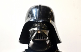 A Darth Vader helmet and mask from the film "The Empire Strikes Back" on display at the Profiles in History auction house on August 28, 2019 in Calabasas, California ahead of "The Icons and Legends of Hollywood Auction" on September 25 and 26. - Darth Vader's helmet from "The Empire Strikes Back" is among a vast collection of coveted Hollywood treasures going under the hammer next month, with experts predicting it could fetch nearly half-a-million dollars. (Photo by Frederic J. BROWN / AFP)