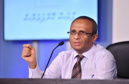 Husnu al-Suood, the president of the Commission on Investigation of Murders and Enforced Disappearances, speaks at press conference regarding their report on the disappearance of journalist Ahmed Rilwan, who has been missing since August 8, 2014. PHOTO: HUSSAIN WAHEED / MIHAARU