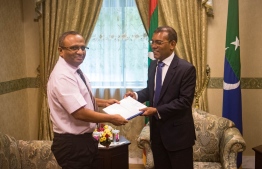 President of Presidential Commission submits report on the investigation into the disappearance of journalist Ahmed Rilwan to Parliament Speaker Mohamed Nasheed. PHOTO: PARLIAMENT