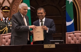 Sri Lanka Prime Minister Ranil Wickremesinghe (L) and Speaker of Parliament Mohamed Nasheed after the prime minister's parliamentary address. PHOTO/MAJILIS