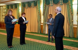 Dr Azmiralda Zahir and Aisha Shujune Muhammad undertake their oath as Supreme Court Judges at the President's Office. PHOTO: PRESIDENT'S OFFICE