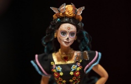The Day of the Dead Barbie doll is based on the famous character imaged by cartoonist Jose Guadalupe Posada PHOTO: PEDRO PARDO / AFP